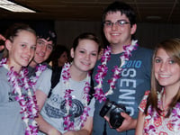 students wearing leis